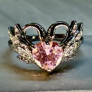 Pink Ice Cubic Zirconia Surrounded By 2 Swans with Channeled CZ’s Silver Plated
